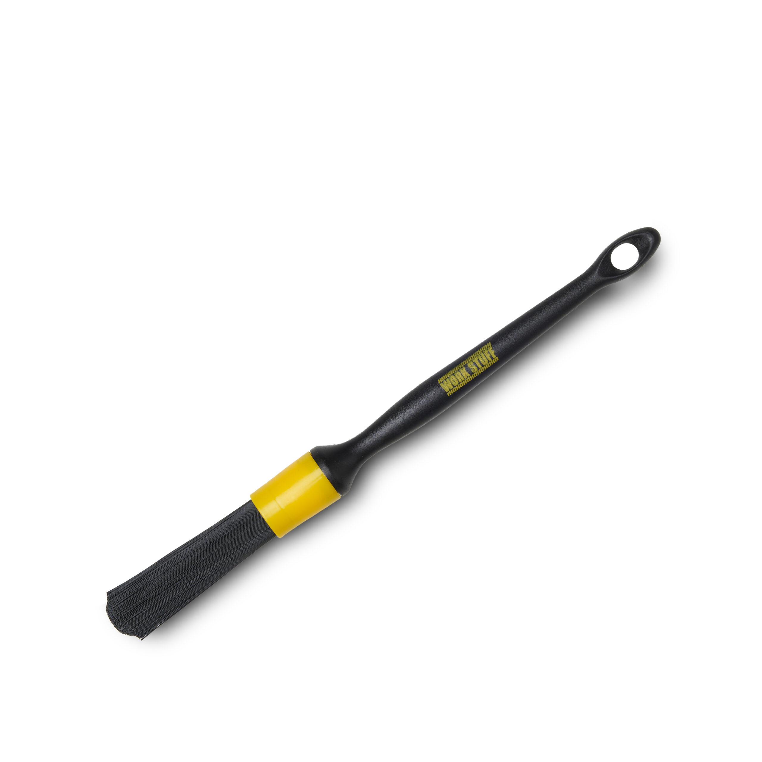 Black cleaning brush with hard bristles, yellow band, long handle with a hole, Work Stuff logo; white background.