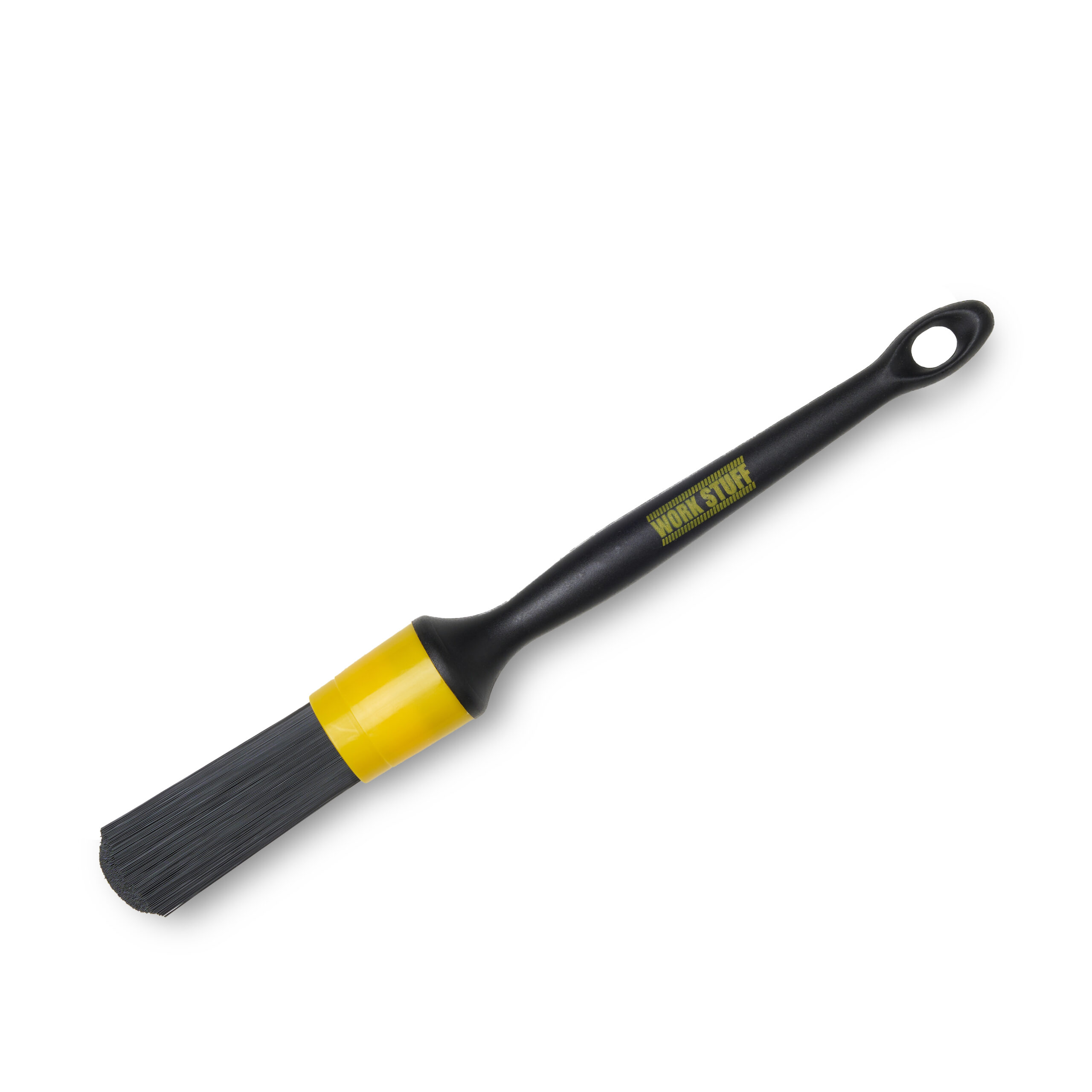 Black detailing brush with stiff bristles, yellow band near tip, hole at handle end, on white background.